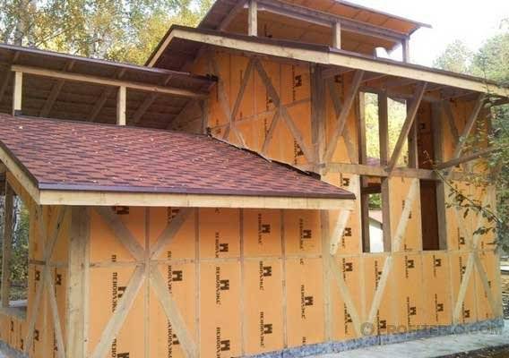 Утепление деревянного дома снаружи: выбор материала и технологии